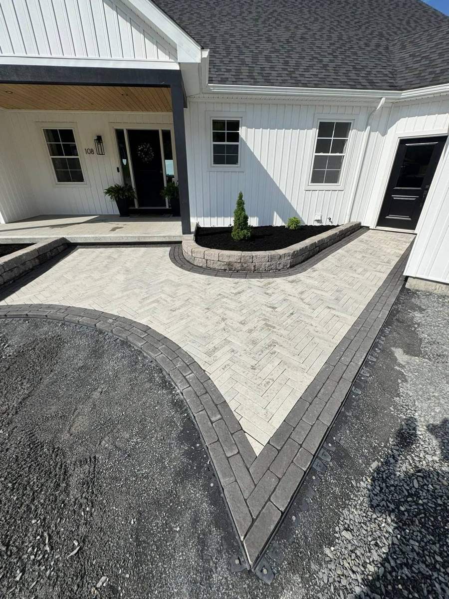 Herringbone paver entry with charcoal border