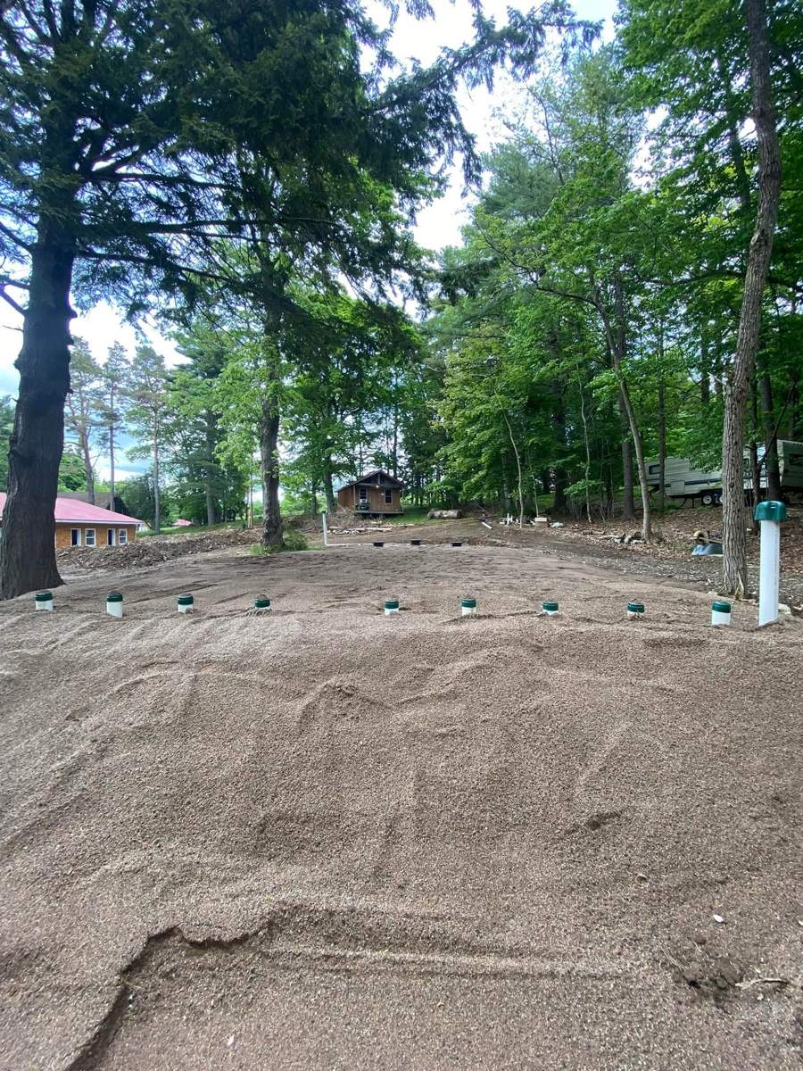 Sand-mound septic field with monitoring ports