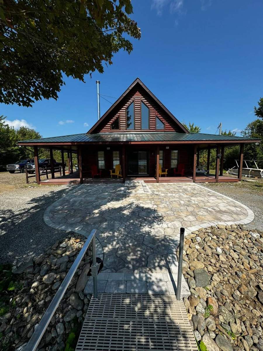 Flagstone patio at a lakeside cabin