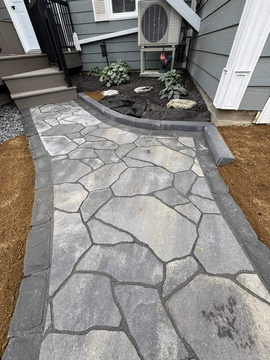 Flagstone side path with border and curb