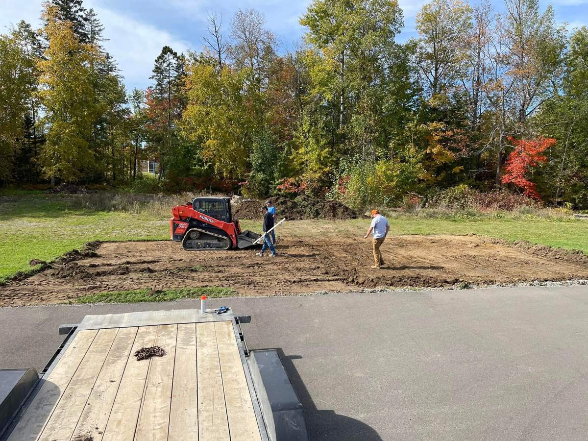 Laying out and levelling a pad for new construction