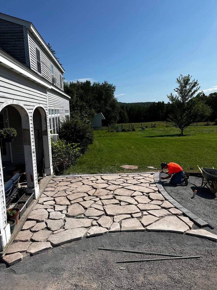 Flagstone patio mid-install